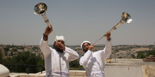 two silver trumpets